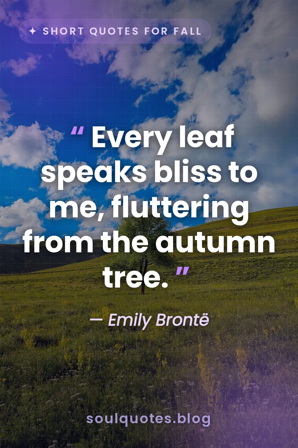 a lone golden tree shedding leaves in the breeze